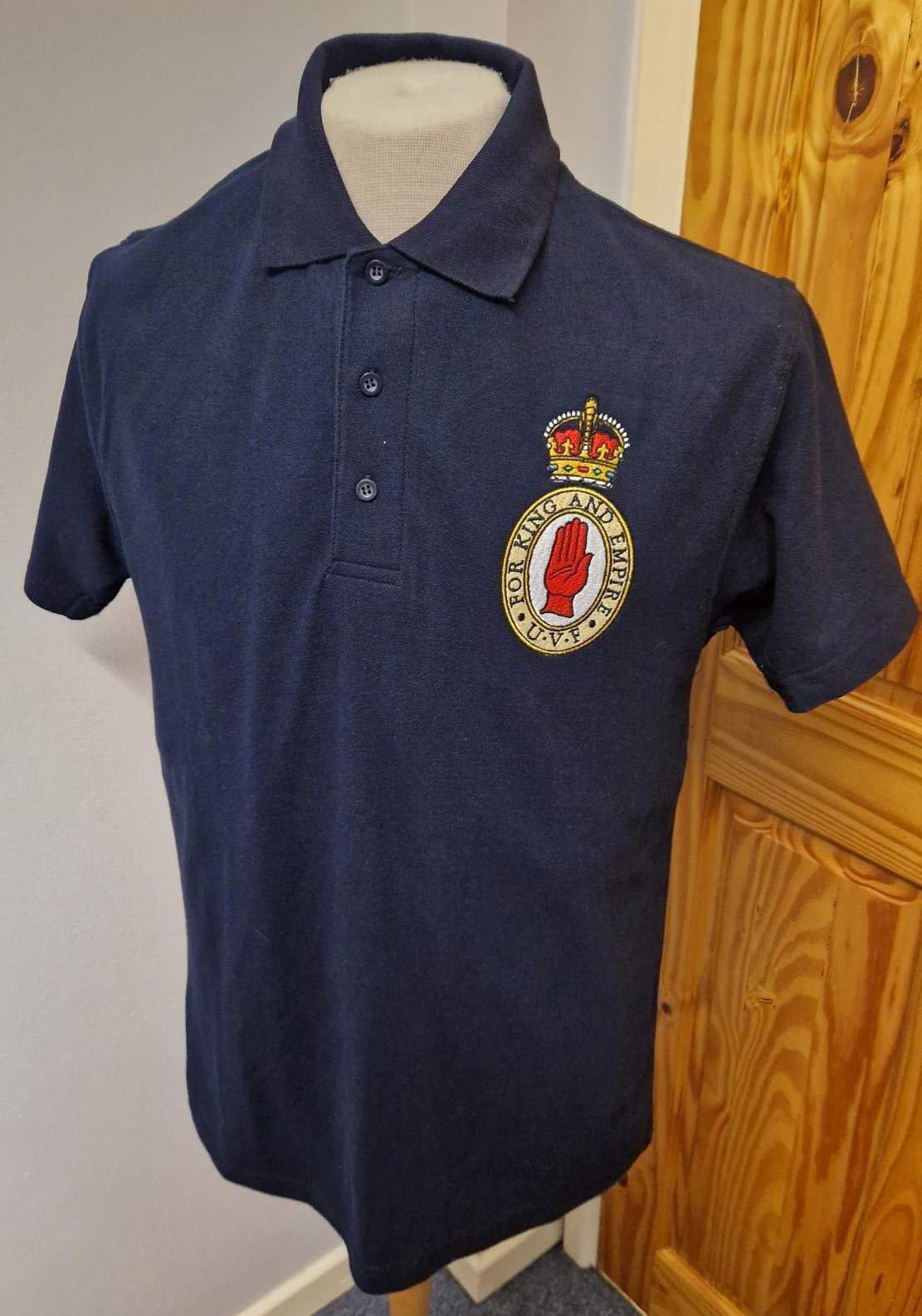 Polo Shirt with UVF – For King & Empire logo | Victor-Stewart Enterprises